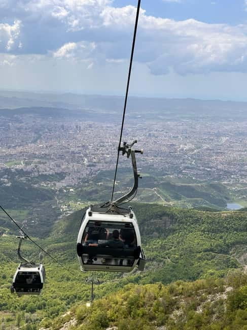 From Tirana : Dajti Mount, Cable Car Ticket With Transport - Leaving Tirana in a small electric car