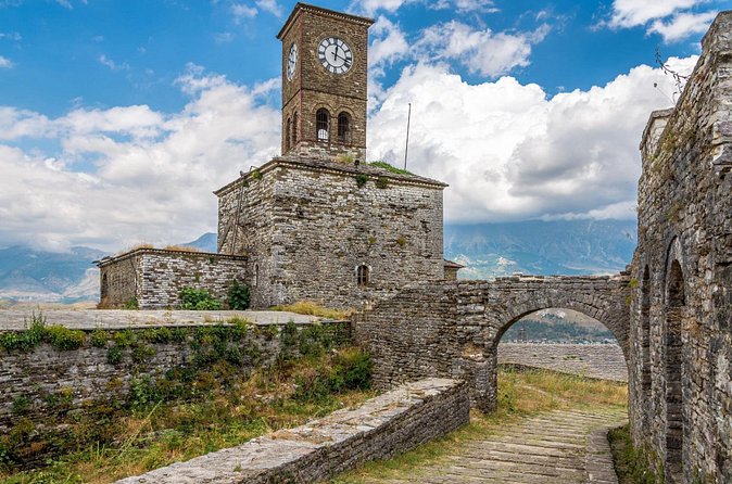 Gjirokastra and Blue Eye Tour from Saranda - Gjirokaster Castle: weapons, prison, and wide valley views