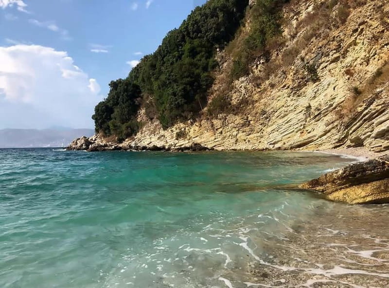 Ksamil Boat Tour To Pulebardha, Pigeon Cave & Snorkelling - Pigeon Cave’s red rock and blue water