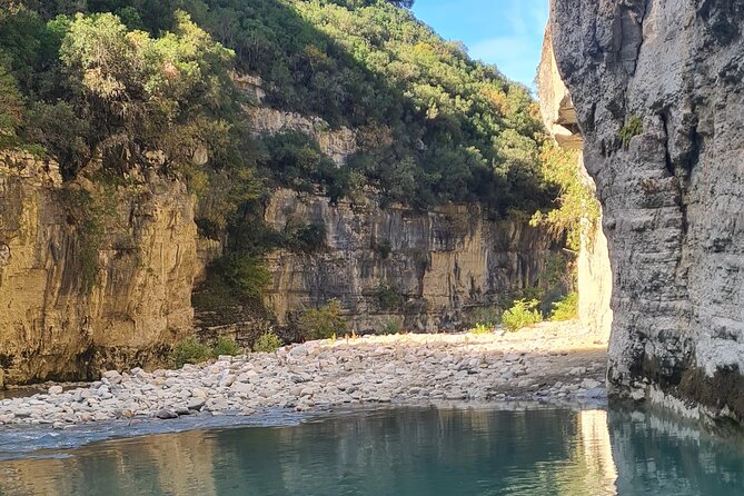 Osum Canyon and Bogovë Waterfall Private Tour - The icy pool beneath the falls