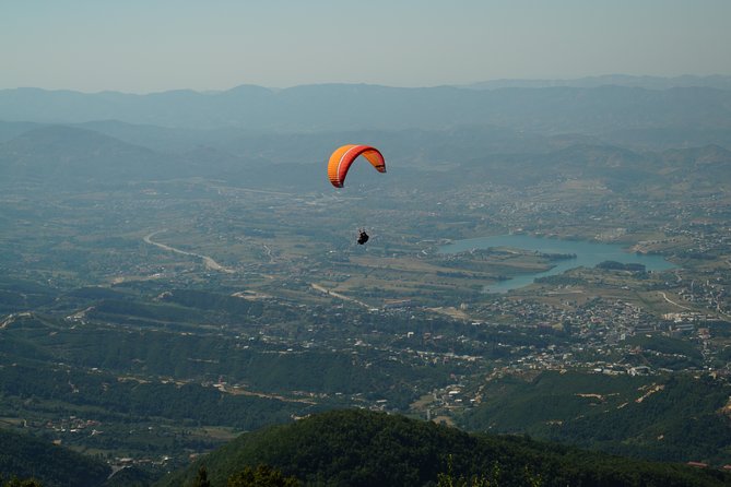 Paragliding Tandem Experience From Dajti Mountain - Landing in the countryside