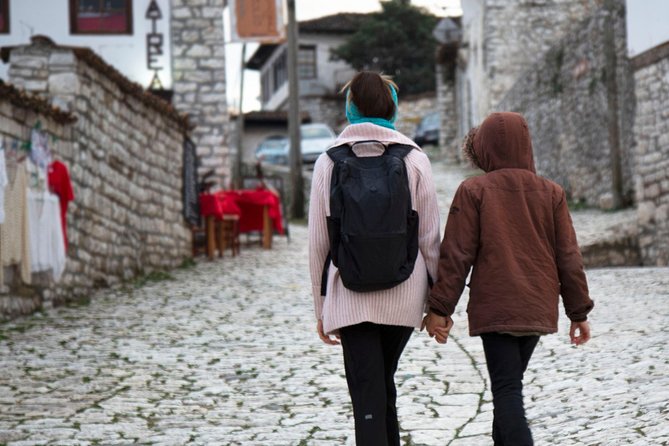 Premium Walking Tour of Berat with Expert Guides - Walking from the old town toward the castle