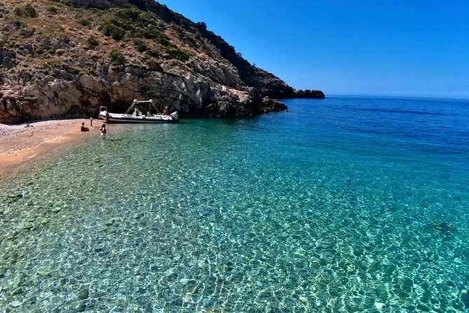 Private Full Day Boat Expedition to Grama Bay - Dafina Beach and the swim to Dafina Cave