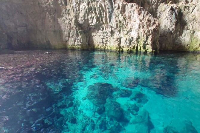 Private Full Day Boat Expedition to Grama Bay - Haxhi Ali Cave: a memorable first stop