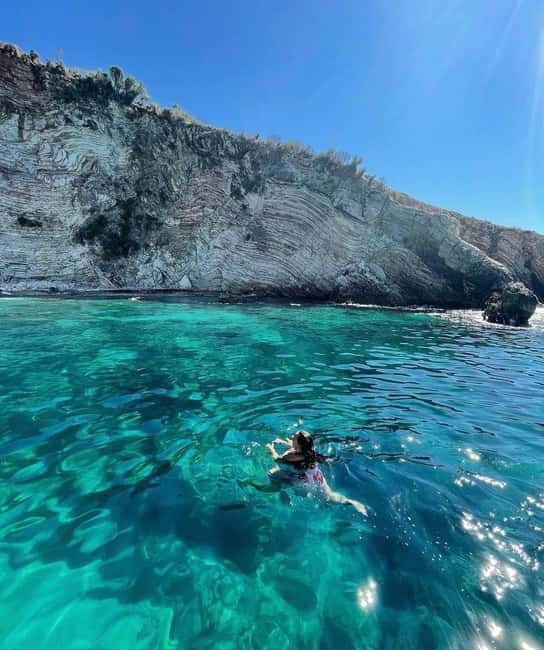 Saranda Boat Tour: Krorez, Kakome, Gremina, Caves & Soldier - Kakome Beach and its rougher coastal beauty