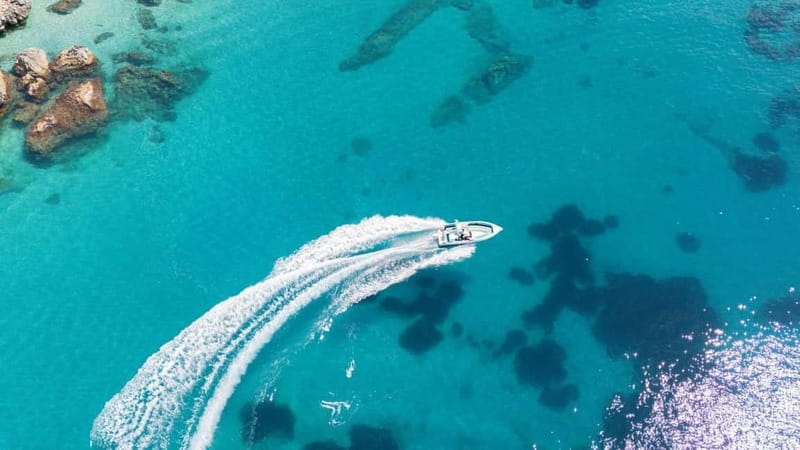 Saranda: Boat Tour to 7 Destinations with Beach Umbrella - Setting out from Saranda on a small speedboat