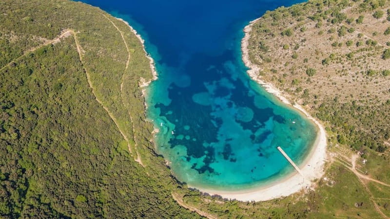 Saranda: Boat Tour to 7 Destinations with Beach Umbrella - What the onboard setup is really worth