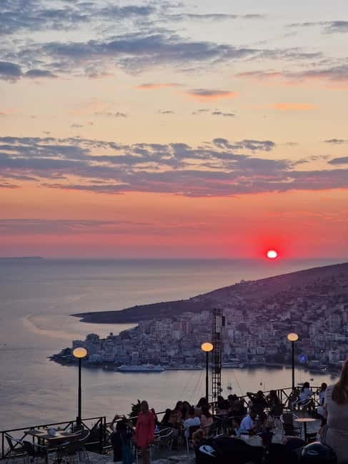 Sarande: Blue Eye Spring and Lekursi Castle Sunset Tour - Sunset over Sarande, Ksamil, and Corfu