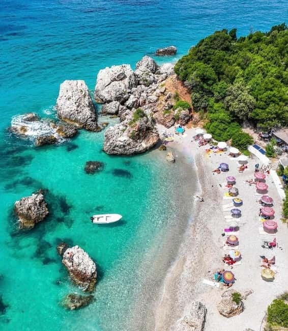 Sarandë: Ionian Coast Hidden Beaches and Caves Boat Tour - Plazhi i Ushtarit: a short first beach stop