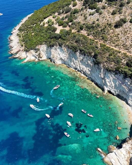 Sarandë: Ionian Coast Hidden Beaches and Caves Boat Tour - Gjiri i Kakomes and another clear-water stop