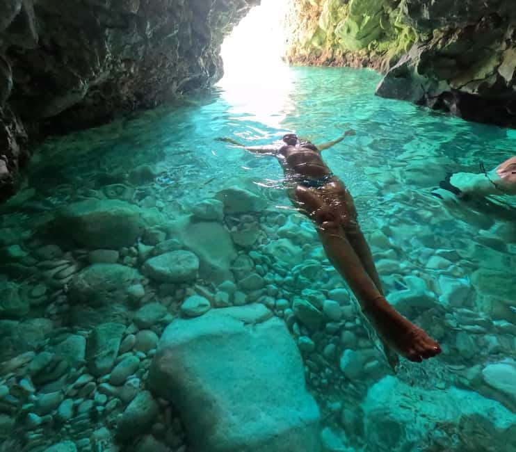 Secret Blue Cave & Grama Bay - Speed Boat Tour - Grama Bay is where the day slows down