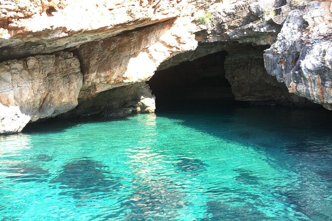 Small Group Speedboat Excursion to Haxhi Ali and Dafina Caves - Cruising past the Boat of Bay and Karaburun cliffs