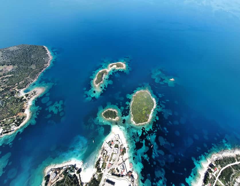 Sunset Sailing to Ksamil Islands with Fruits and Drinks - The first 10 minutes among Ksamil’s islands