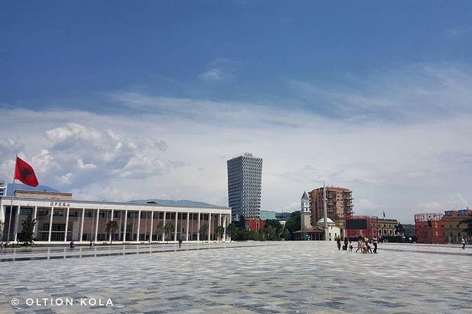 Tirana Hidden Treasures Sightseeing Tour - The Pyramid and Bell of Peace show a changing Tirana