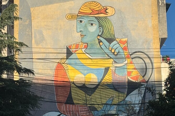 Tirana Mural Bike Tour: Street Art, Culture & Photography Stops - FAB Gallery and the upside-down bunker