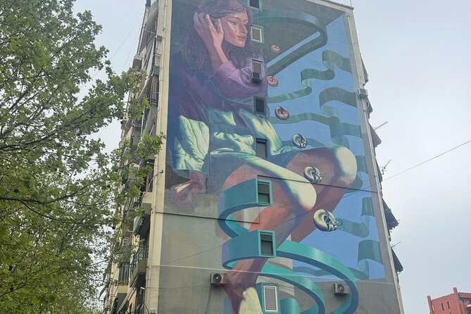 Tirana Mural Bike Tour: Street Art, Culture & Photography Stops - Reja, The Cloud, and Tirana’s modern public art