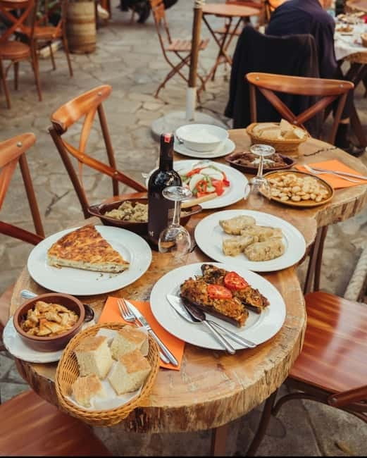 Tirana: Walking Tour through Attractions of Historic Center - The Pyramid and Postbllok tell harder stories