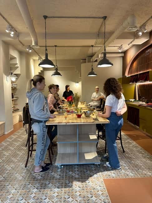 Traditional Albanian Cooking Class in Tirana & Raki Tasting - Arriving at a warm Albanian table