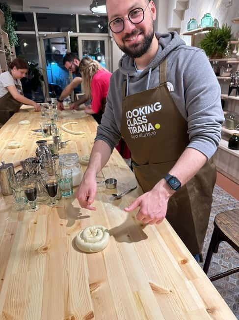 Traditional Albanian Cooking Class in Tirana & Raki Tasting - Rolling burek dough the Albanian way
