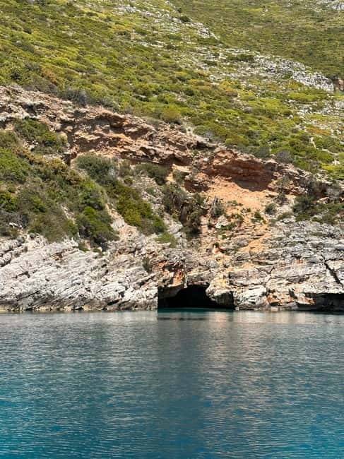 Vlora: Grama Bay and Blue Cave Speedboat Tour Adventure - Dafina Cave adds a short, atmospheric stop