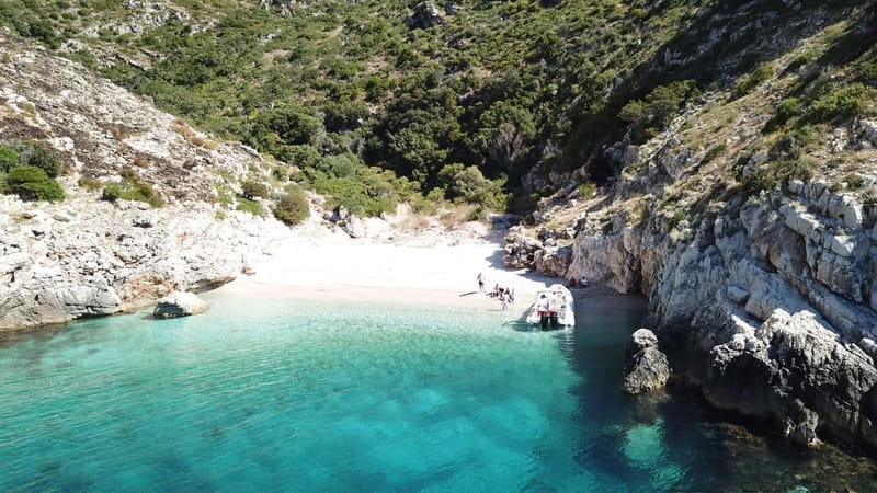 Vlore: Haxhi Ali Cave and Dafina Cave Speedboat Tour - Dafina Bay and its small beach cave